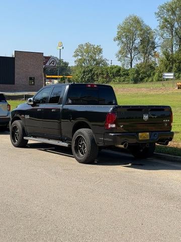 2015 RAM 1500 4WD Quad Cab 6.4 Ft Box Sport