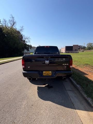 2015 RAM 1500 4WD Quad Cab 6.4 Ft Box Sport