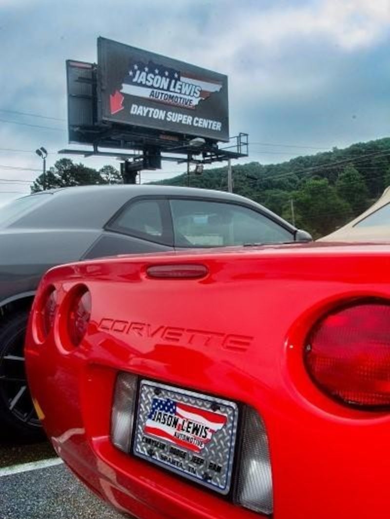 The back of a red Corvette on the Jason Lewis Dayton Supercenter lot